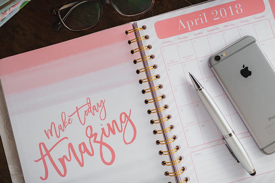 Pink calendar, notebook, diary, desk, text, indoors, paper, pen HD wallpaper