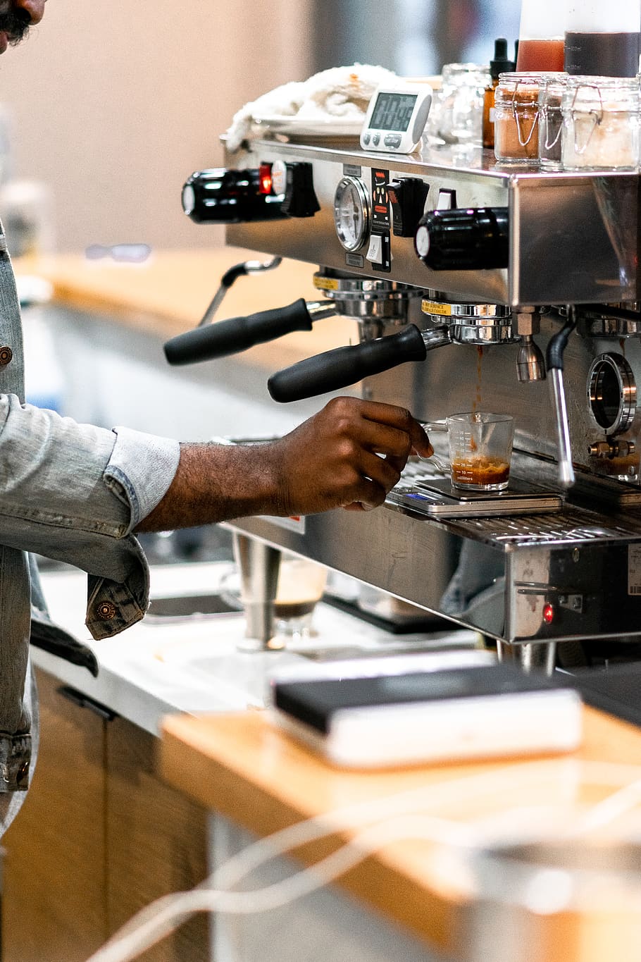 man using grey coffee machine, coffee cup, dallas, wood, drink HD wallpaper