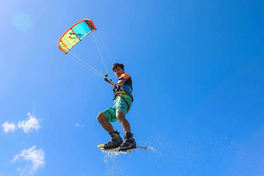 Photo of Pointing Man Kitesurfing, action, action energy, adventure