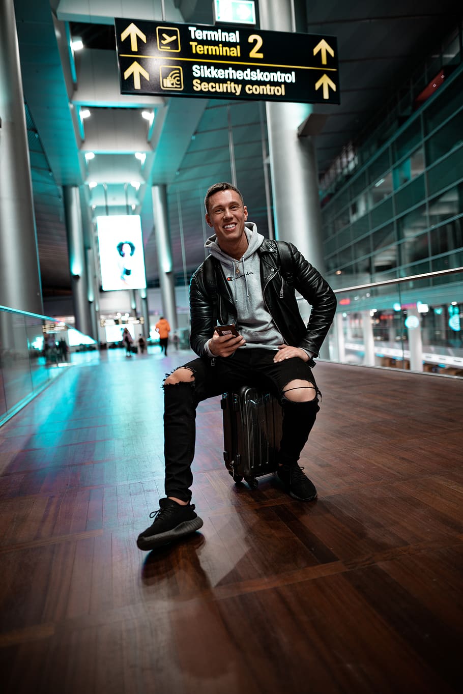 man sitting on suitcase, full length, airport, real people, luggage HD wallpaper