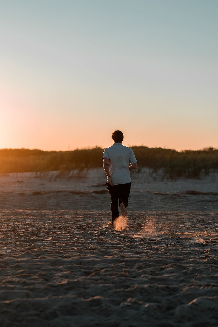 person walking on the sand, ocean, dune, beach, sea, tropical