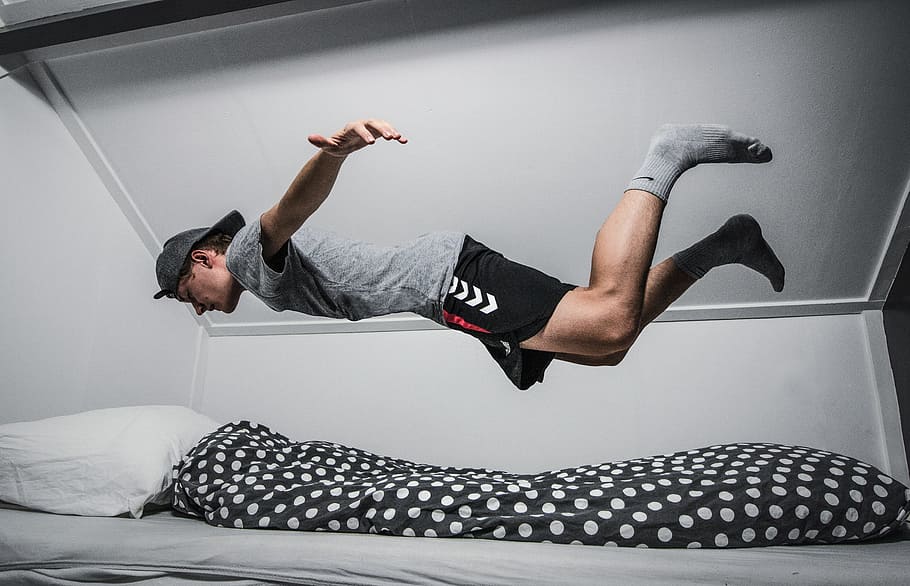Falling asleep, sleeping, levitate, levitation, man, male, jumping on bed, HD wallpaper