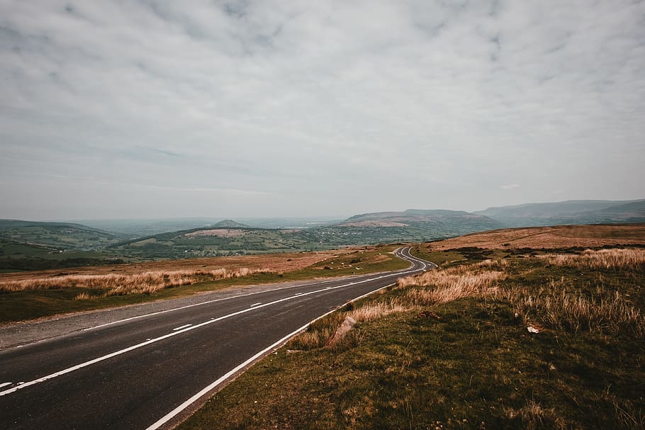 gray asphalt road under cloudy sky, landscape, grass, horizon HD wallpaper