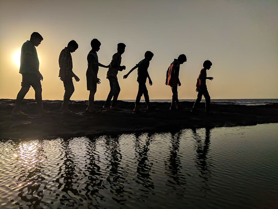 Group of Children Walking Near Body of Water Silhouette Photography HD wallpaper