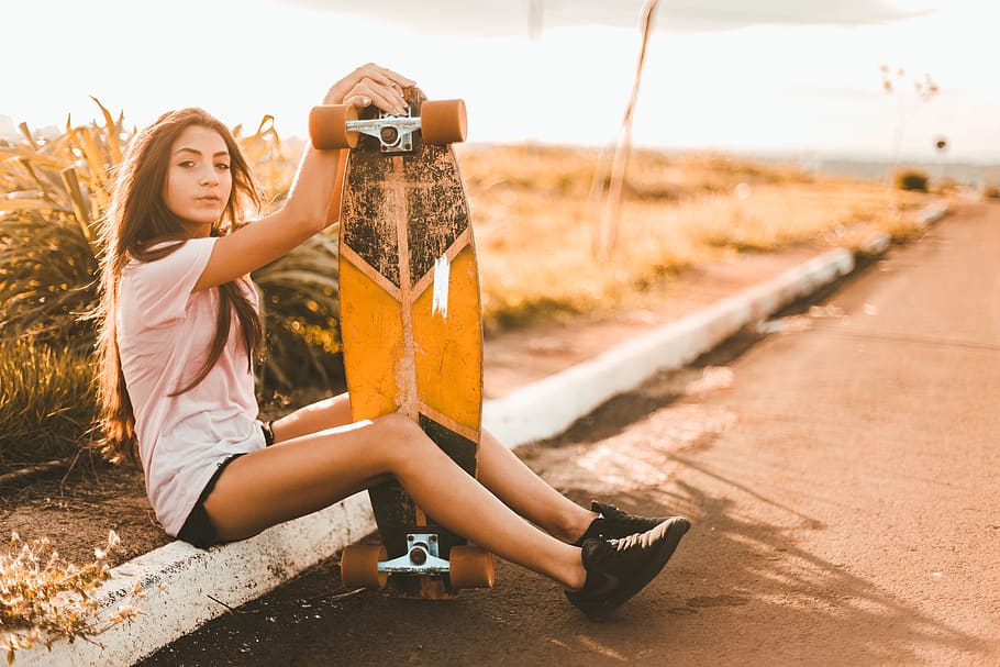 Shallow Focus Photography of Woman Holding Longboard, beautiful
