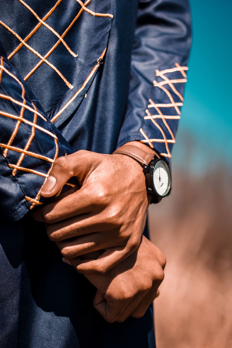 man standing while wearing blue coat, human, person, finger, hand HD wallpaper