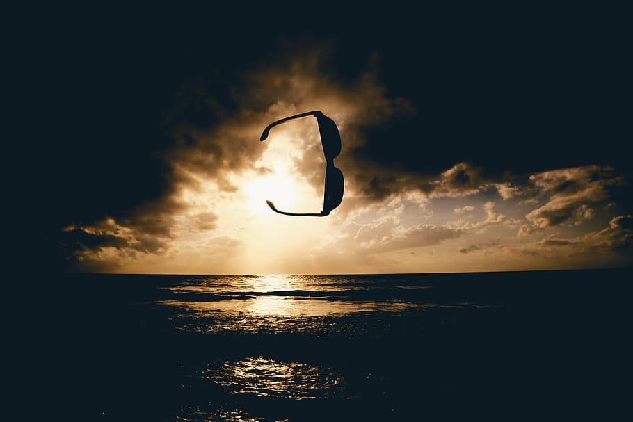 Body of Water during Dawn, backlit, clouds, dark, dark clouds HD wallpaper