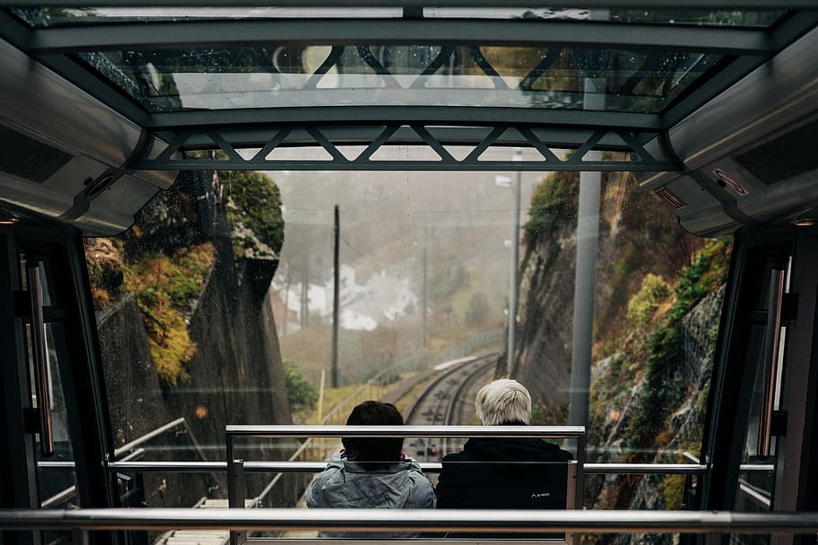 two person sitting inside cable car, human, handrail, banister, HD wallpaper