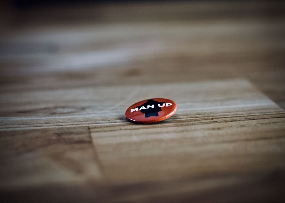 round red and black man up pin back button, badge, wood, bokeh, HD wallpaper