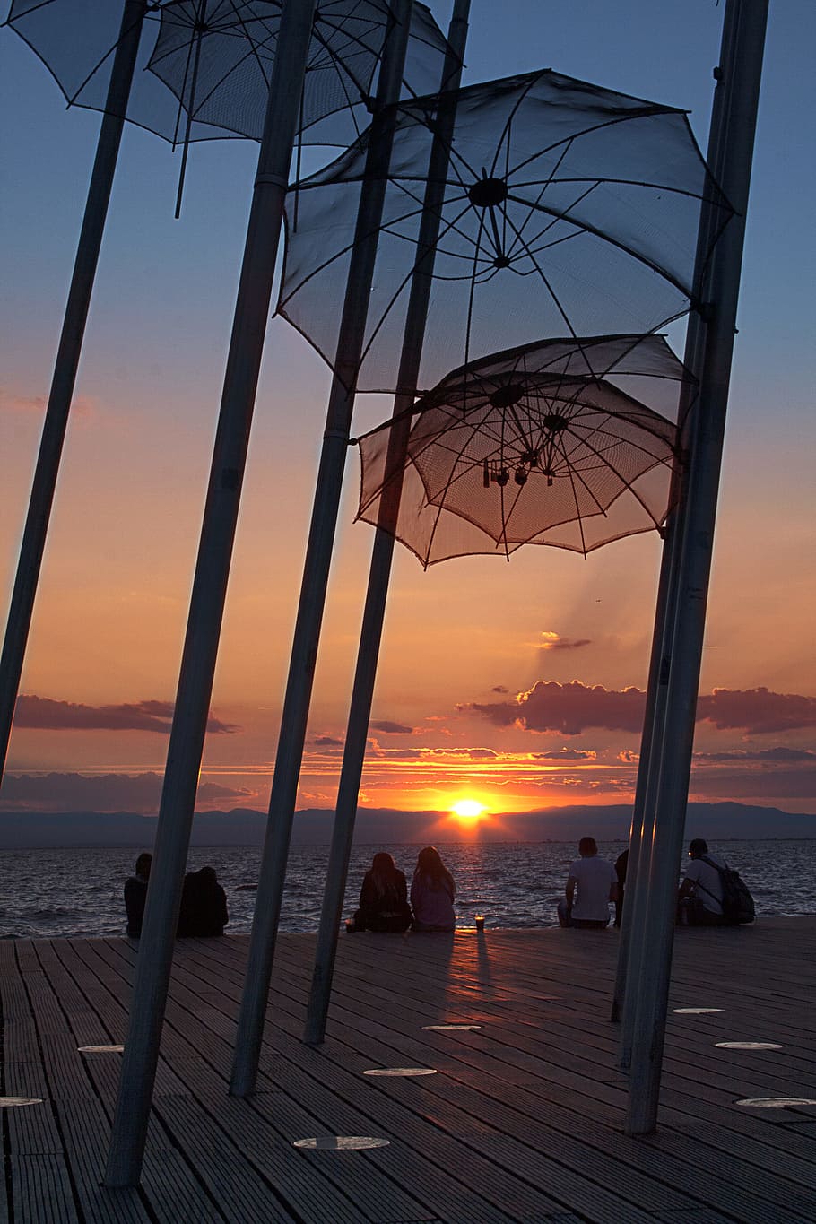 Umbrellas Hanged on Poles Near Dock, beach, clouds, deck, dusk HD wallpaper