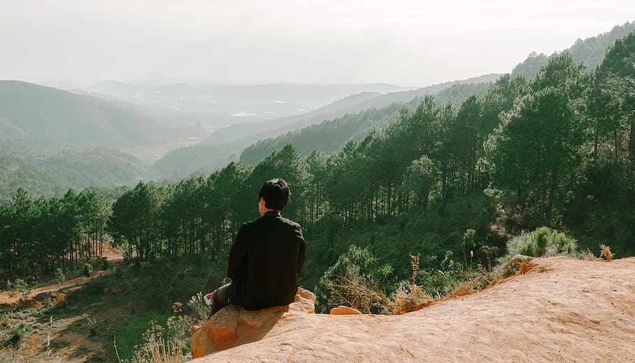 Person Sitting Near Hill Cliff, adventure, daylight, environment HD wallpaper