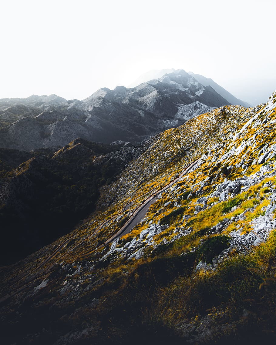 aerial photography of mountain, road, cliff, rock, stone, moss HD wallpaper