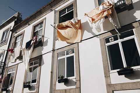 Clothes Hanged on Wire Beside House, apartment, architectural design HD wallpaper