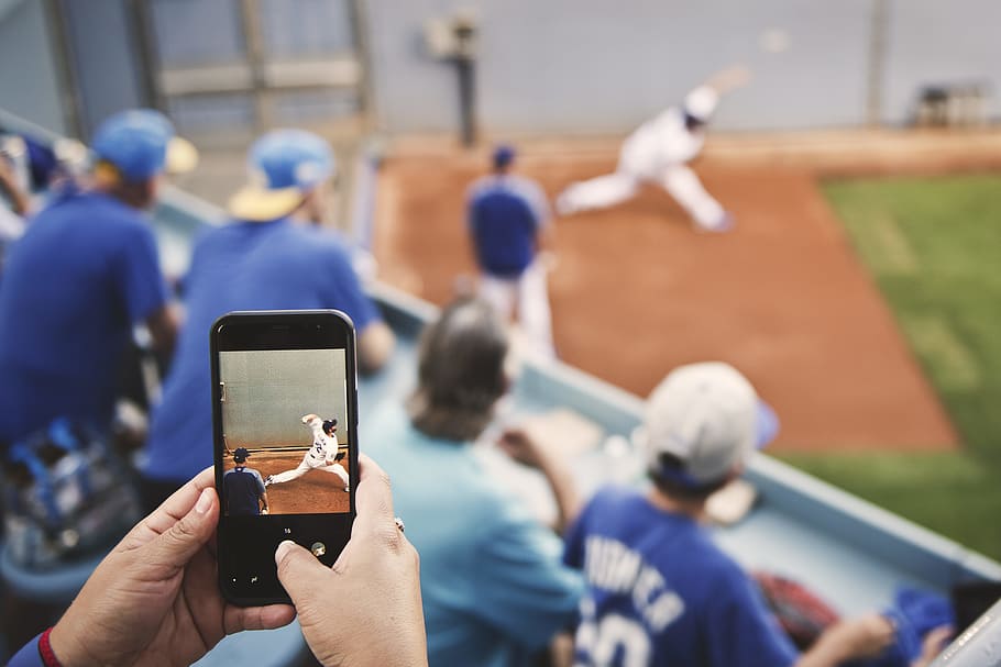 selective focus photo of phone displaying baseball player, iphone, HD wallpaper