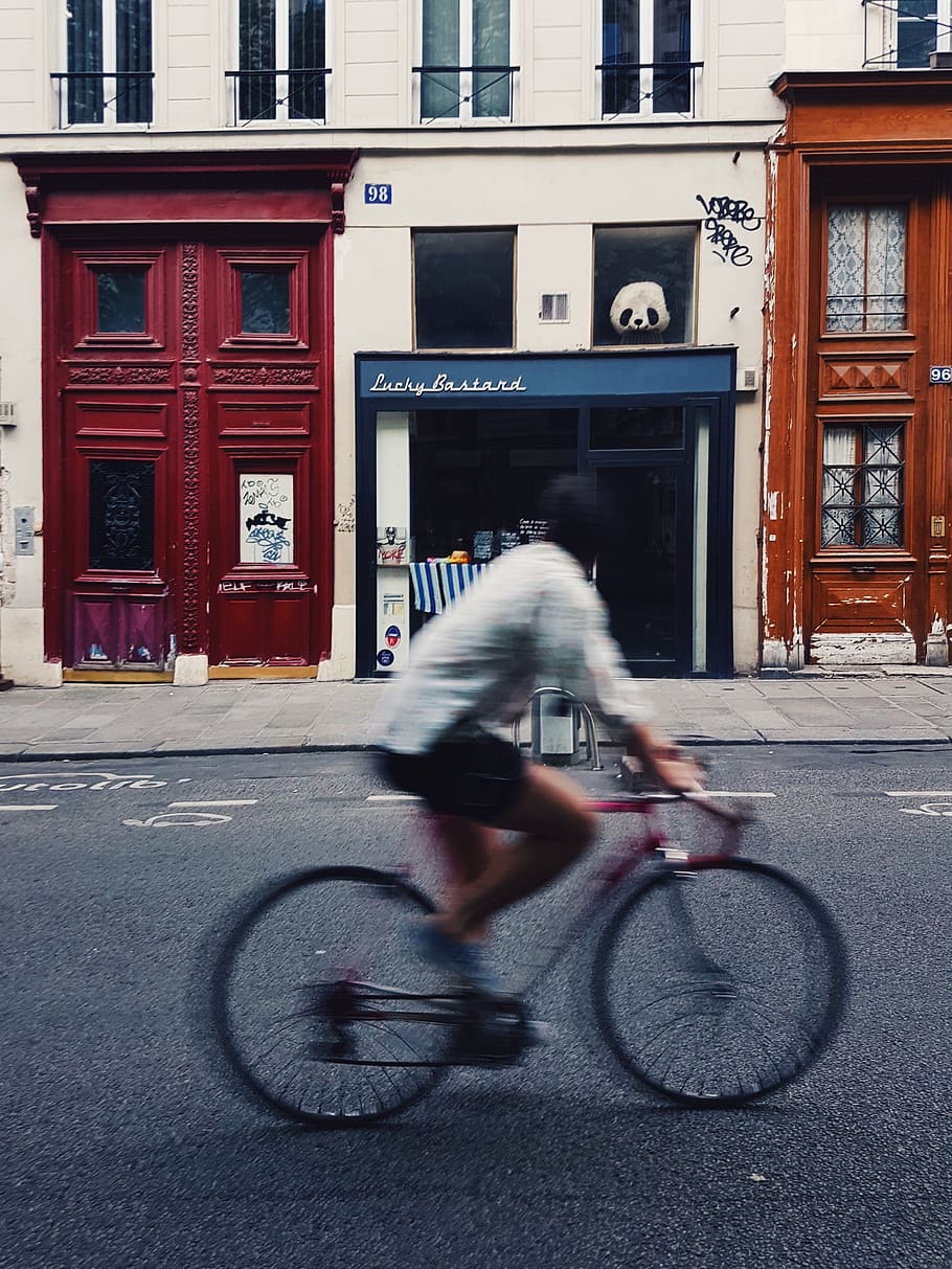 man riding on pink bicycle, bike, transportation, vehicle, machine HD wallpaper