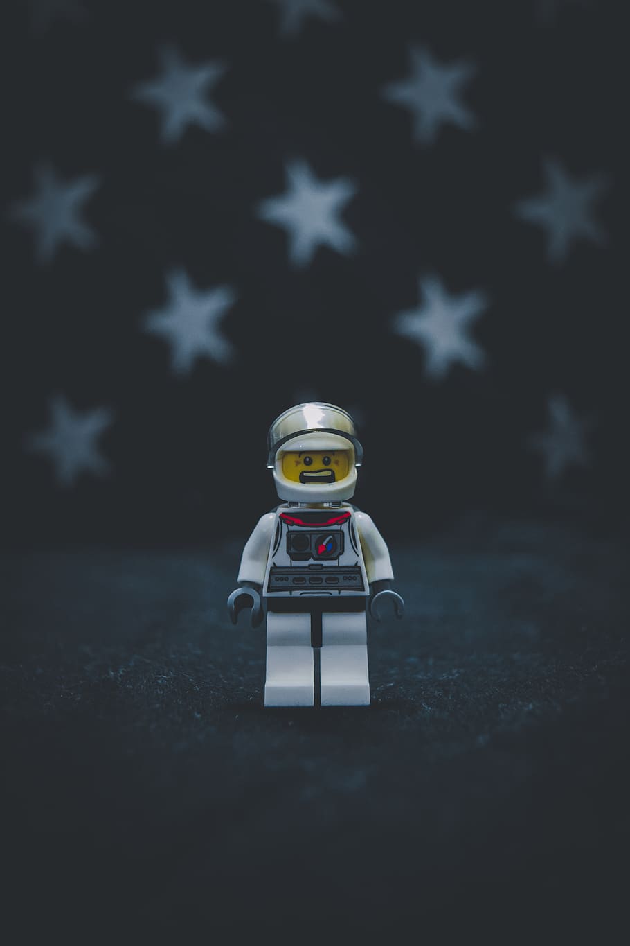 selective focus photography of of Lego minifig toy, clothing