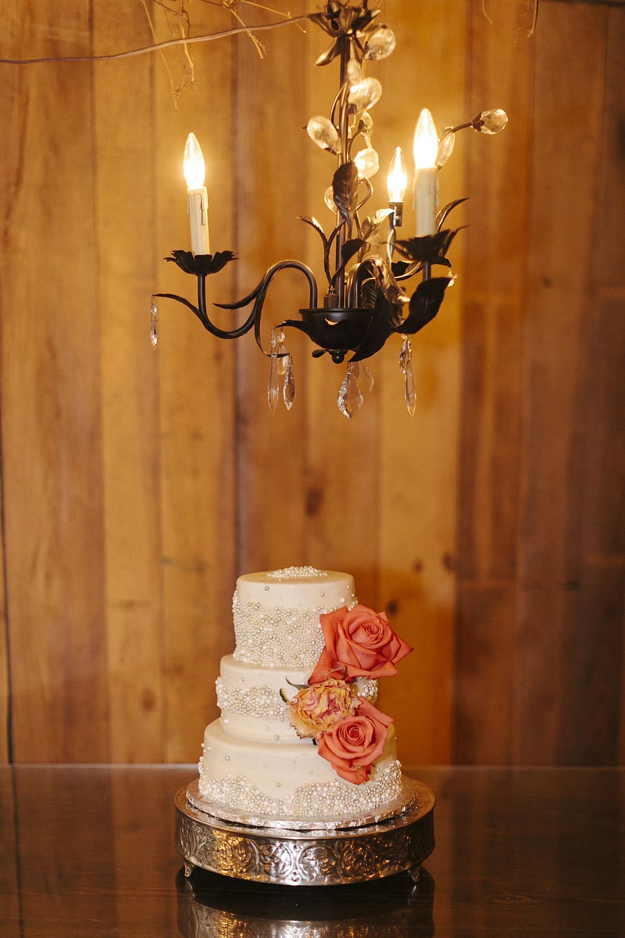 3-layered cake on brown table, burning, flame, indoors, focus on foreground HD wallpaper