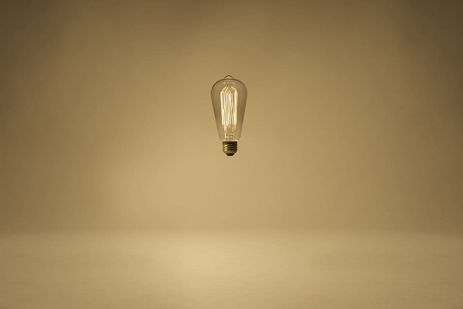 HD wallpaper: lighted clear light bulb floating in mid air, magic ...