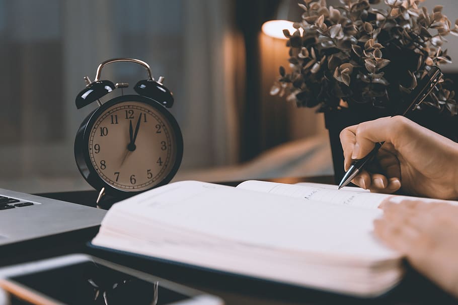 Work desk with a retro clock. After midnight., time, indoors HD wallpaper
