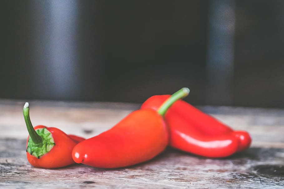 Three Bell Peppers, background, black background, blur, cayenne HD wallpaper