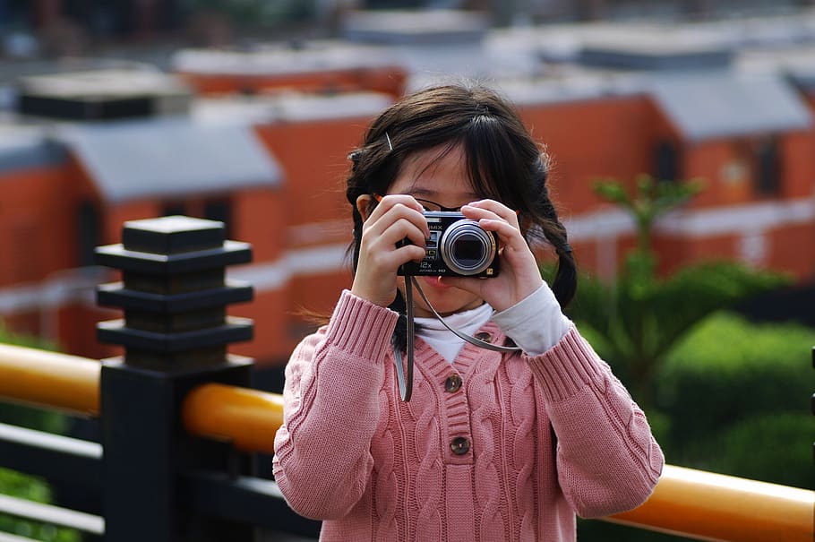 girl taking photo using point-and-shoot camera, camera - photographic equipment