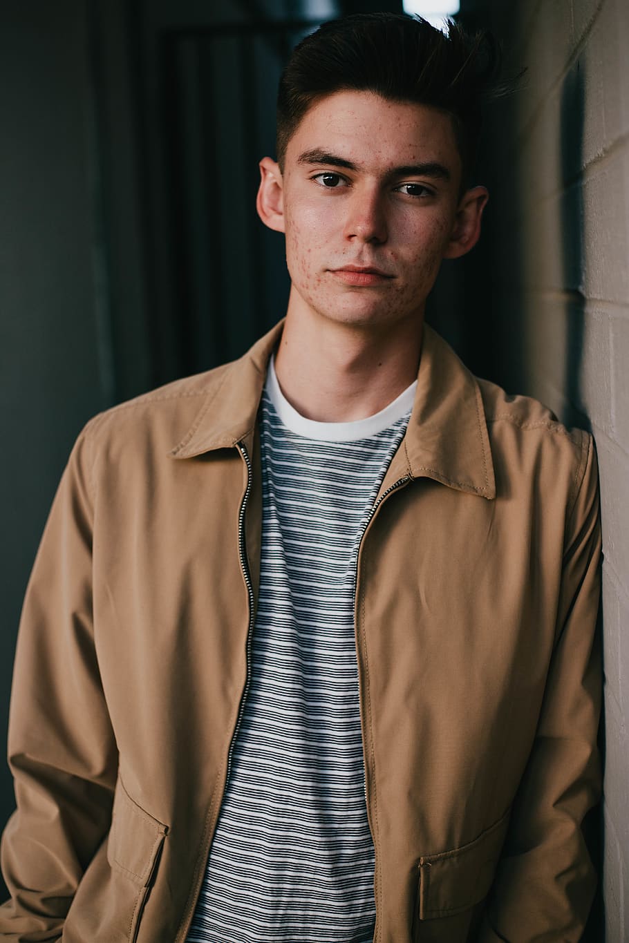 man wearing brown collared jacket, looking at camera, one person HD wallpaper