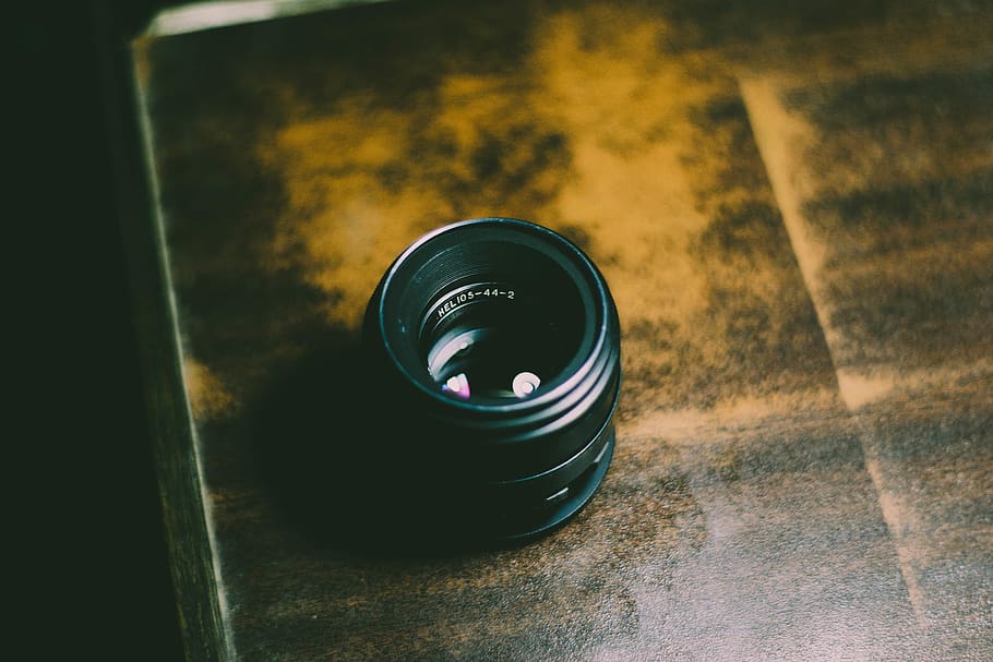 Person Taking Photo of Camera Lens, action, aperture, blur, close-up HD wallpaper