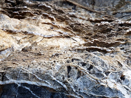 Rough rock teture of contrasting light and dark brown color, texture HD wallpaper