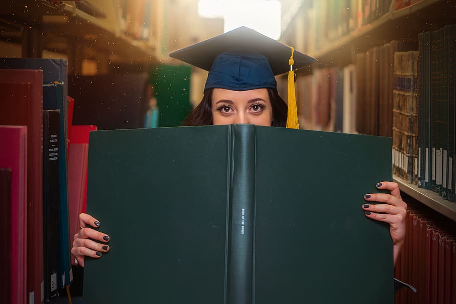 woman holding book, graduation, human, person, girl, college, HD wallpaper