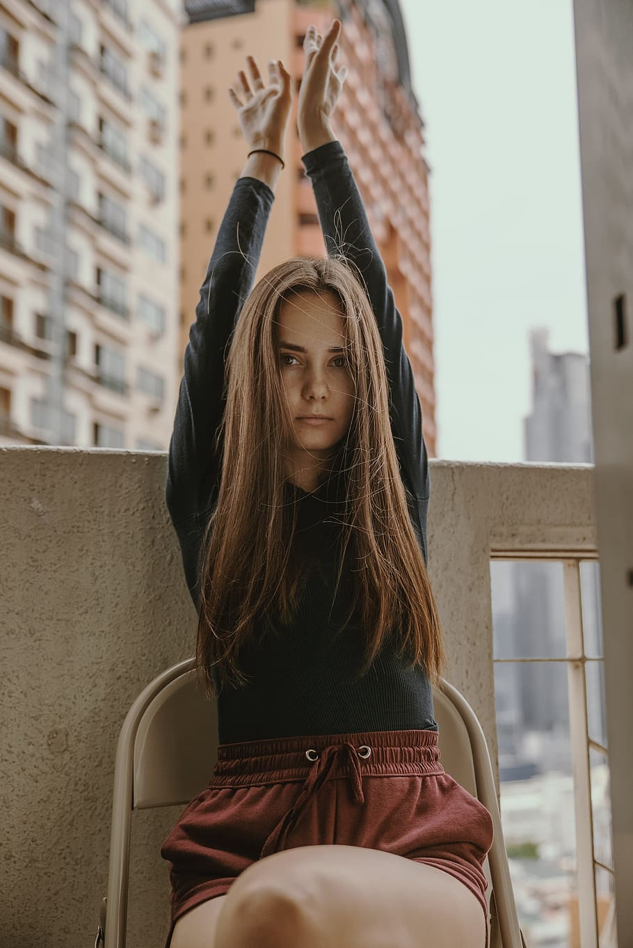woman raising her hand holding, portrait, dance, looking, brunette HD wallpaper