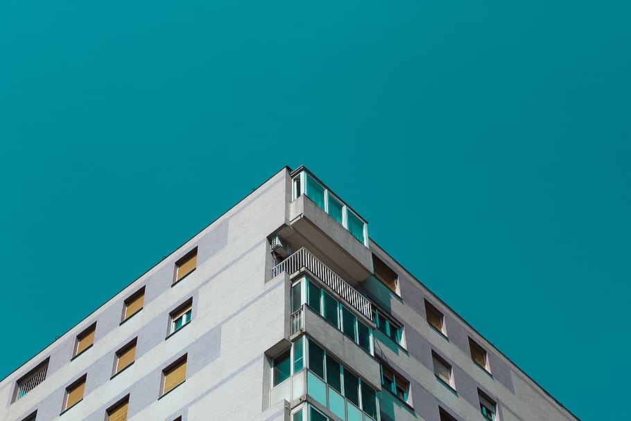 minimalist photography of high-rise building, corner, architecture
