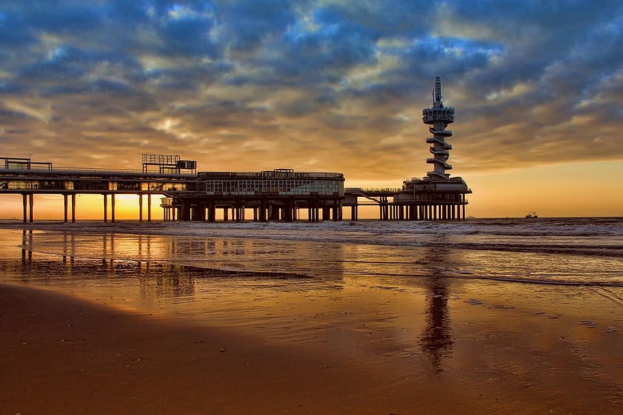 Black Concrete Building, beach, clouds, dawn, ocean, overcast HD wallpaper