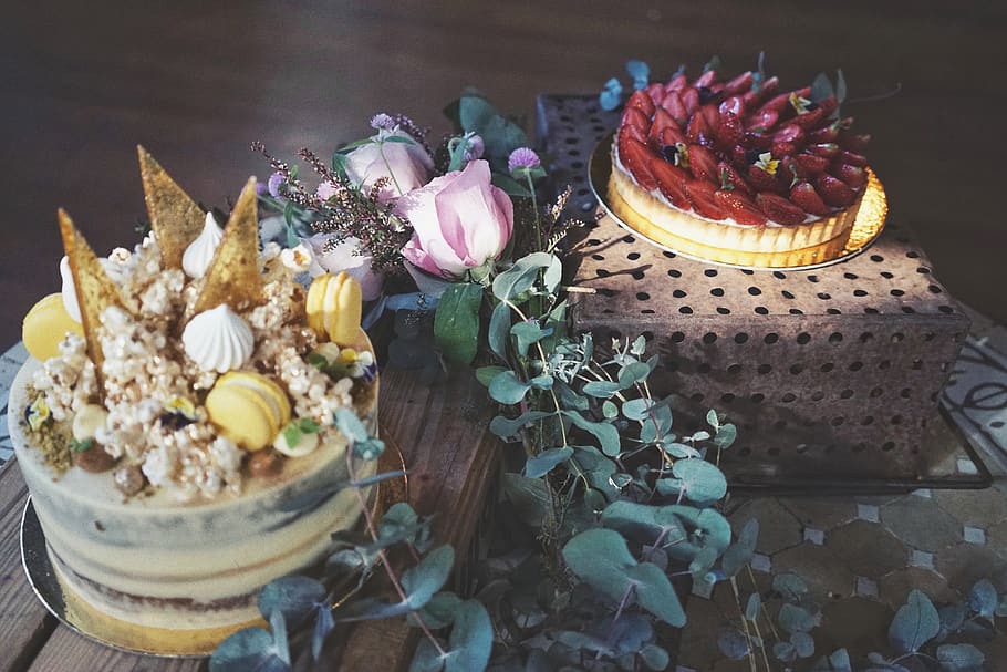 two cakes on table, freshness, flower, flowering plant, indoors HD wallpaper