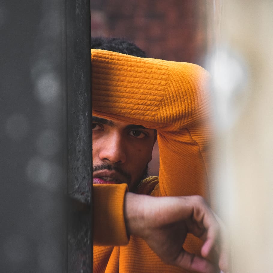 Man In Orange Long Sleeve Shirt Leaning On Wall, model, person HD wallpaper