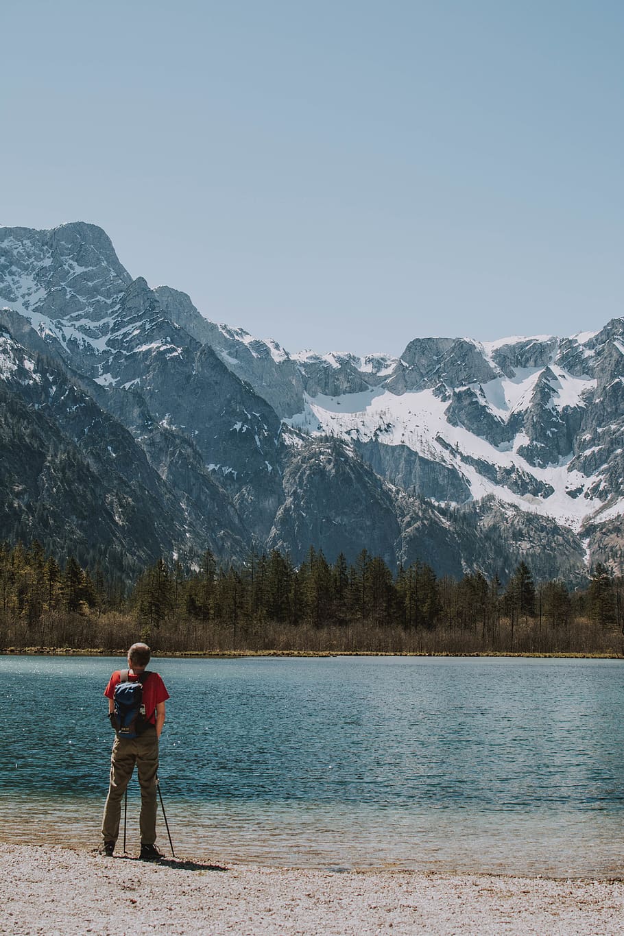 Man Standing On Seashore Facing Mountain, lake, landscape, nature HD wallpaper