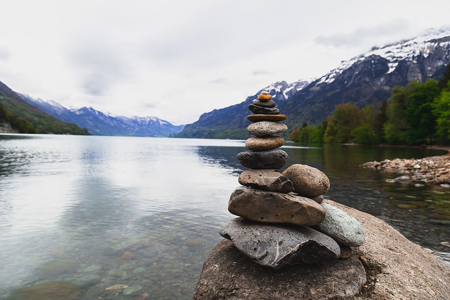 Brown and Gray Stone Stack Near Body of Water, balancing, daylight HD wallpaper