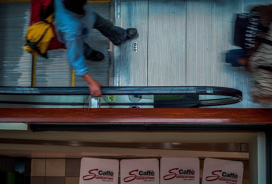 man on escalator, person, human, people, brick, bench, furniture HD wallpaper