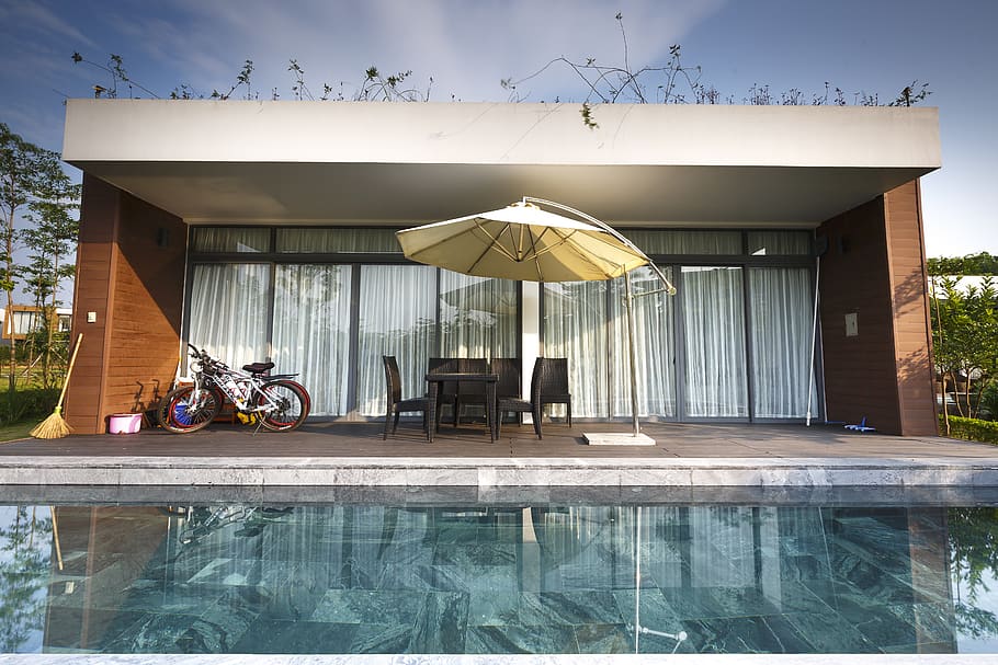 Bikes Near Chairs and Cantilever Parasol, architecture, bicycle HD wallpaper
