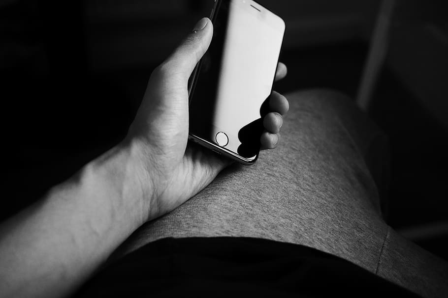 Person Holding Iphone, apple, black-and-white, hand, iphone 6, HD wallpaper