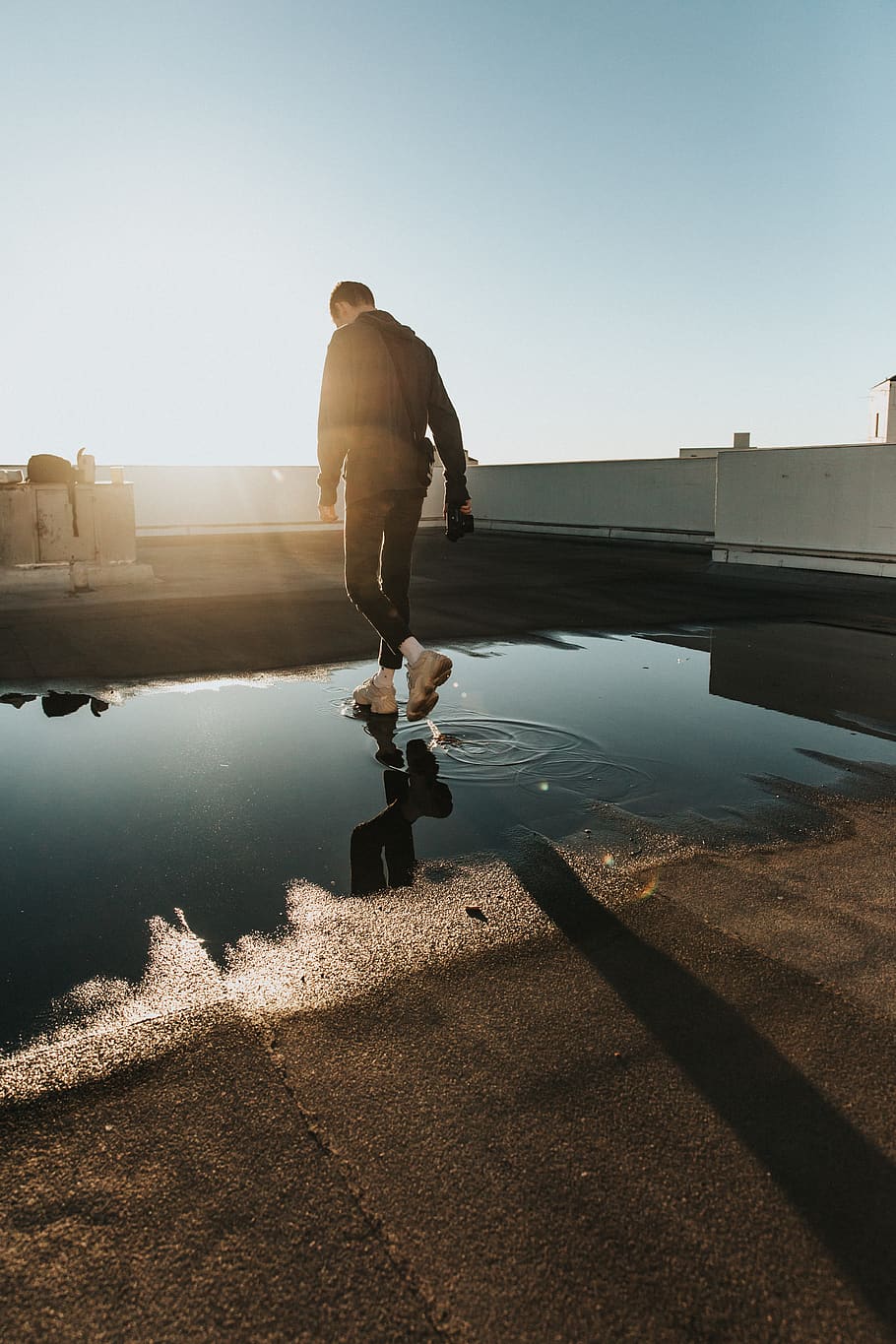man walking on water puddle, full length, sky, sunlight, one person HD wallpaper