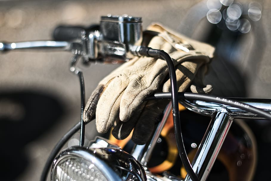 Photo of a Glove on Motorcycle Handlebar, 4k wallpaper, accessory HD wallpaper