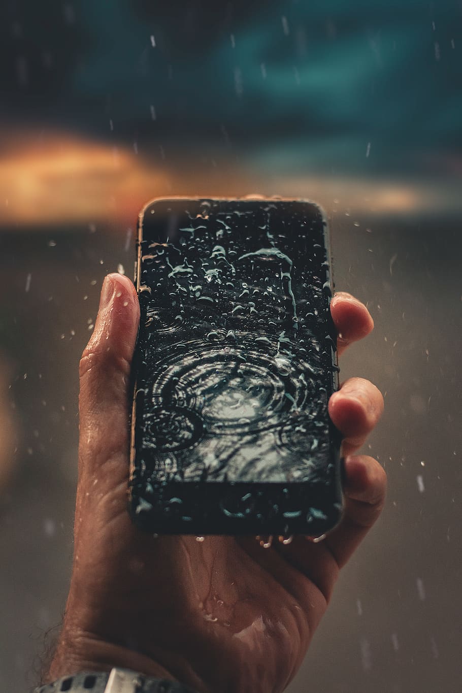 Photo of Person Holding Wet Smartphone, blur, cellphone, close-up