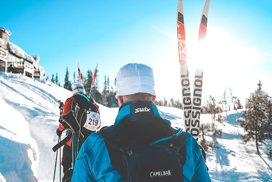 two men snow skiing, person, human, nature, outdoors, apparel HD wallpaper