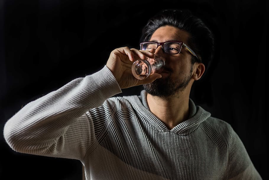 man drinking on clear drinking glass, person, human, accessories HD wallpaper