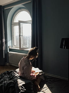 Woman Sitting While Reading A Book , bedroom, indoors, light HD wallpaper