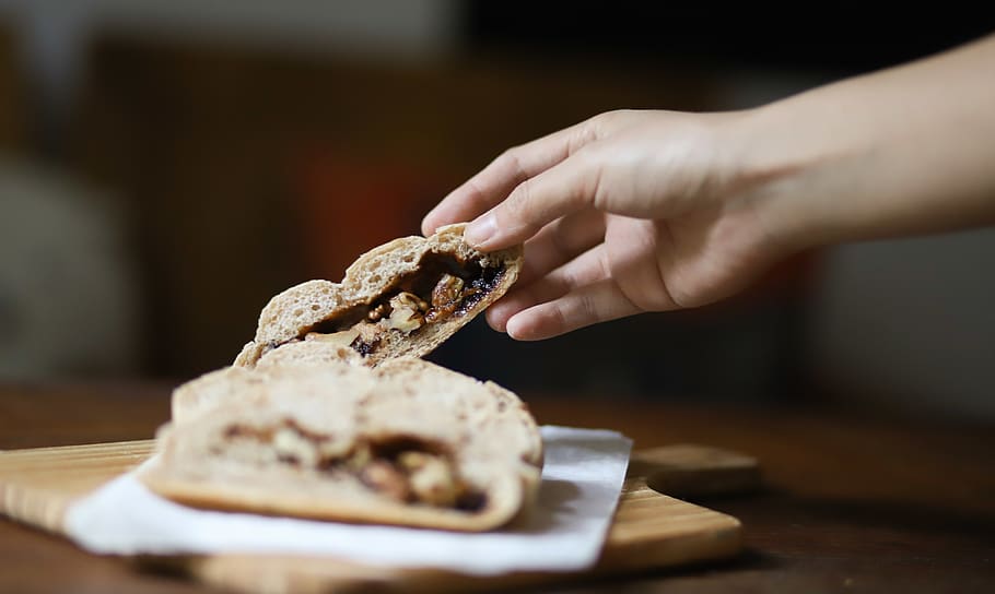 Person Getting Slice Bread, delicious, food, hand, pastry, human hand HD wallpaper