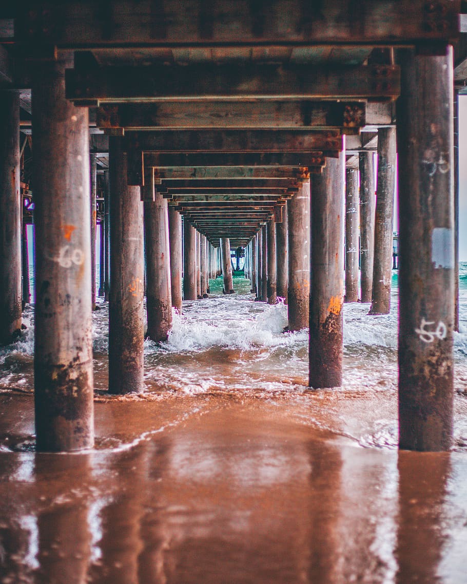 Brown Wooden Framed Glass Window, beach, close-up, columns, concrete structure HD wallpaper