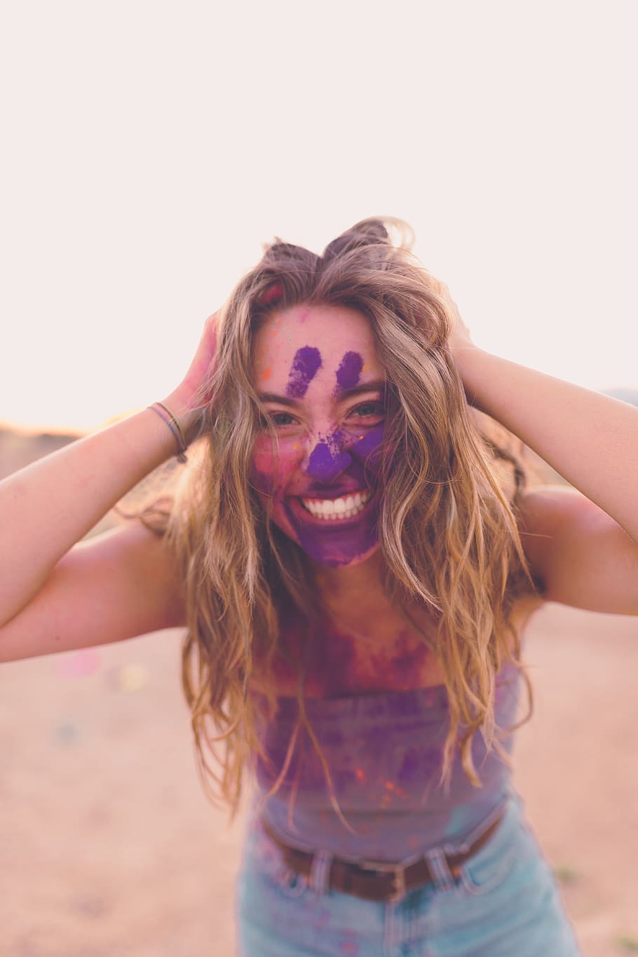 smiling woman holding head, one person, hair, long hair, looking at camera HD wallpaper