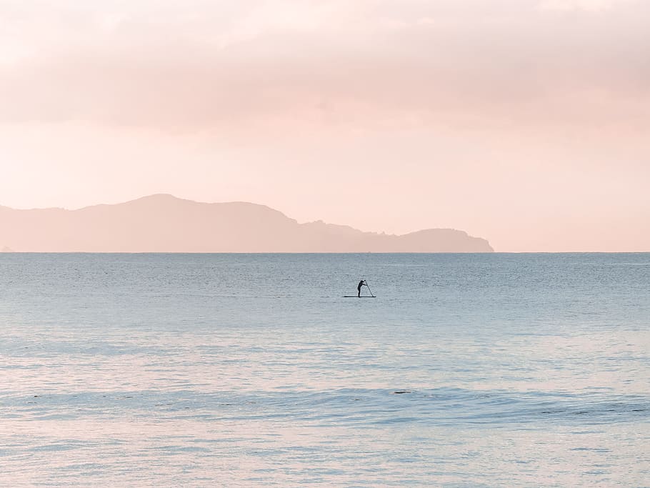 Man Rowing a Boat on Sea at Daytime, clouds, daylight, fog, landscape HD wallpaper