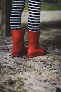 black and white striped rain boots